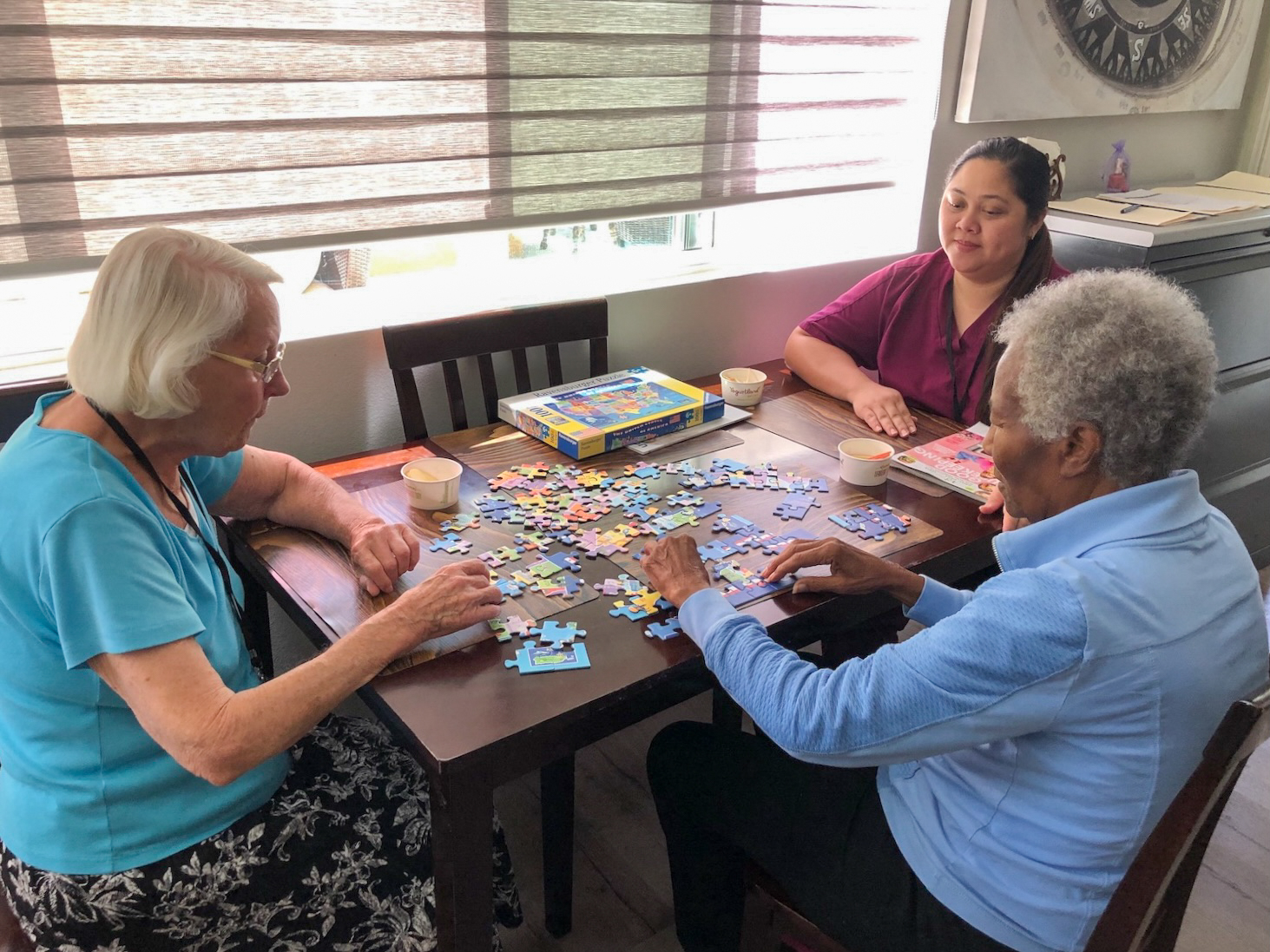 Residents completing a jigsaw puzzle